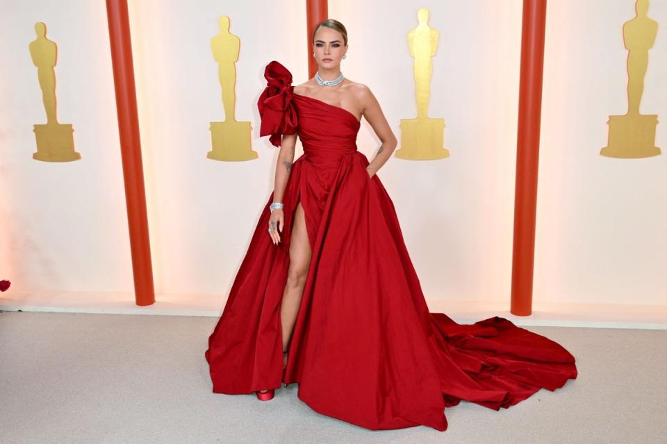 Cara Delevingne in Elie Saab, Stuart Weitzman and Bulgari: (AFP via Getty Images)