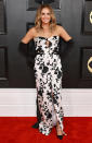 <p>Country star <a href="https://people.com/country/grammys-2023-carly-pearce-excited-same-room-adele-beyonce/" rel="nofollow noopener" target="_blank" data-ylk="slk:Carly Pearce attends her first Grammys;elm:context_link;itc:0;sec:content-canvas" class="link ">Carly Pearce attends her first Grammys</a> in a romantic floral gown with keyhole cutout, black opera gloves and pumps with a sparkling detail. </p>