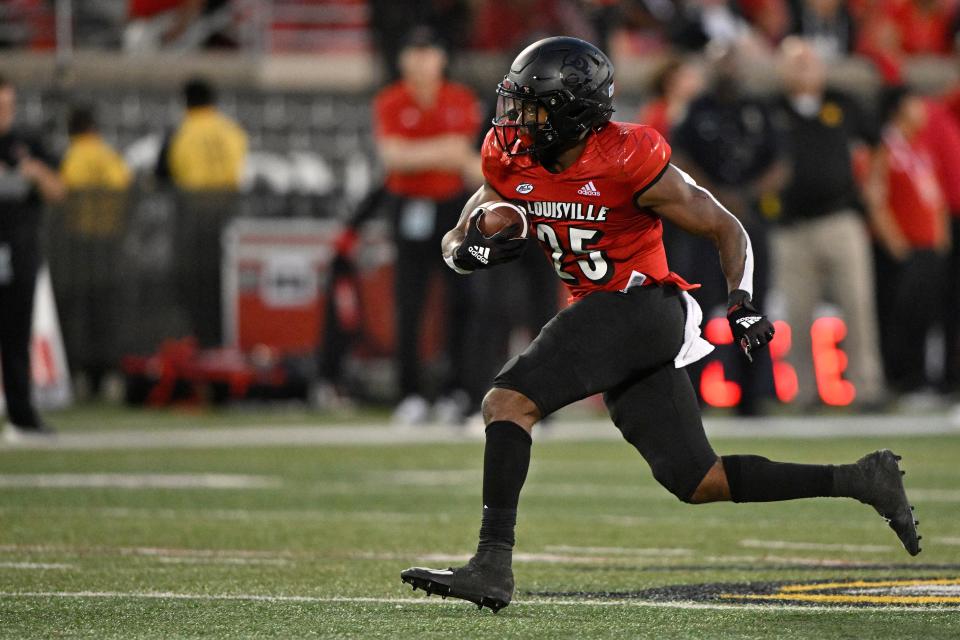 Sep 16, 2022; Louisville, Kentucky, USA;  Louisville Cardinals running back Jawhar Jordan (25) runs the ball against the Florida State Seminoles during the first quarter at Cardinal Stadium. Mandatory Credit: Jamie Rhodes-USA TODAY Sports