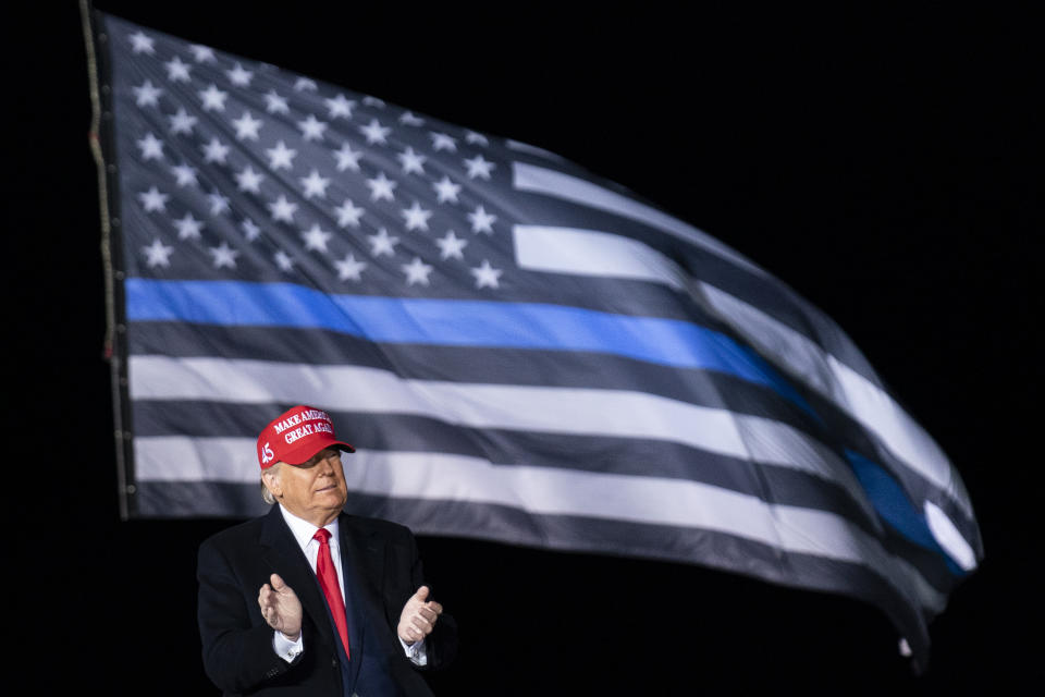 President Donald Trump arrives to speak during a campaign rally at Southern Wisconsin Regional Airport, Saturday, Oct. 17, 2020, in Janesville, Wis. (AP Photo/Alex Brandon)