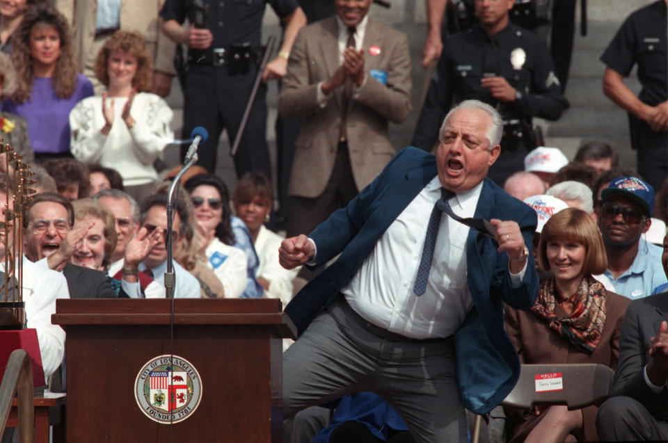 Tommy Lasorda dances for the team's fans during celebrations of their World Series win in downtown Los Angeles, CA, on Oct. 24, 1988. (AP Photo/Doug Pizac)