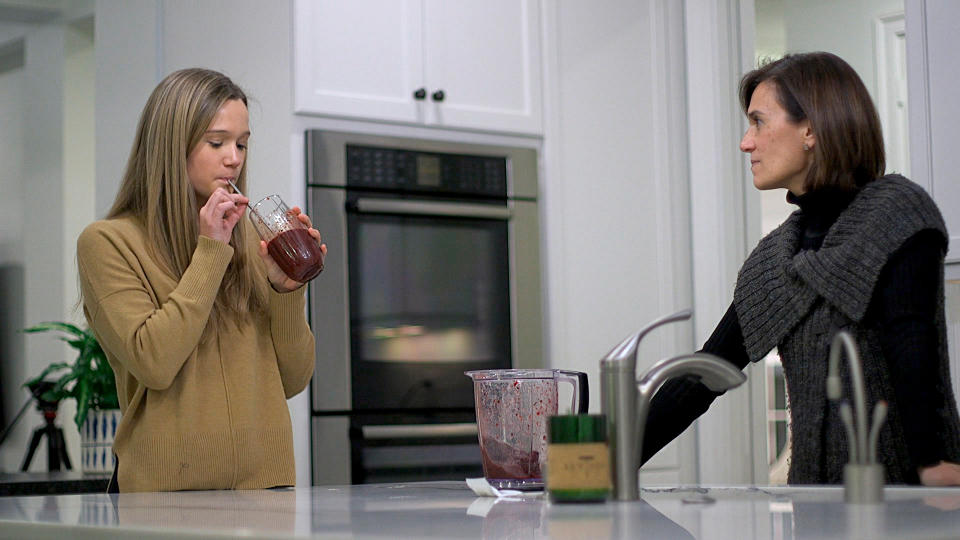 In this Jan. 10, 2020 image from video, 18-year-old Nina Nichols takes her daily dose of Palforzia as her mother, Maria Acebal watches, in her home in Washington. On Friday, Jan. 30, 2020, the Food and Drug Administration approved Palforzia, the first treatment for peanut allergies in a big step toward better care for all kinds of food allergies -- but still a long way from a cure. (AP Photo/Federica Narancio)