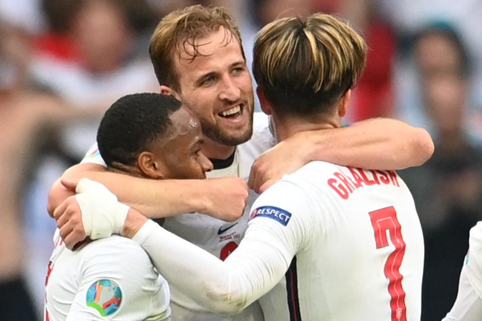 England's forward Harry Kane (C) celebrates with England's forward Raheem Sterling (L) and England's midfielder Jack Grealish after their win in the UEFA EURO 2020 round of 16 football match between England and Germany at Wembley Stadium in London on June 29, 2021. (Photo by Andy Rain / POOL / AFP) (Photo by ANDY RAIN/POOL/AFP via Getty Images)