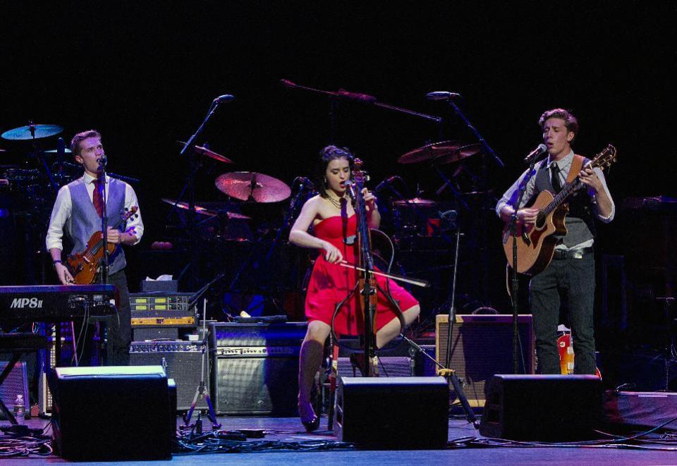 This image released by New York University shows NYU Steinhardt student songwriters, from left, A.J. Smith, of Washington, Tiger Darrow, of Dallas, and Peter Wise open for the Eagles at Inaugural Vision Award Gala, Thursday, Nov. 15, 2012 in New York. The gala honored the Eagles for their distinctive musical vision. (AP Photo/New York University, Mathieu Asselin)