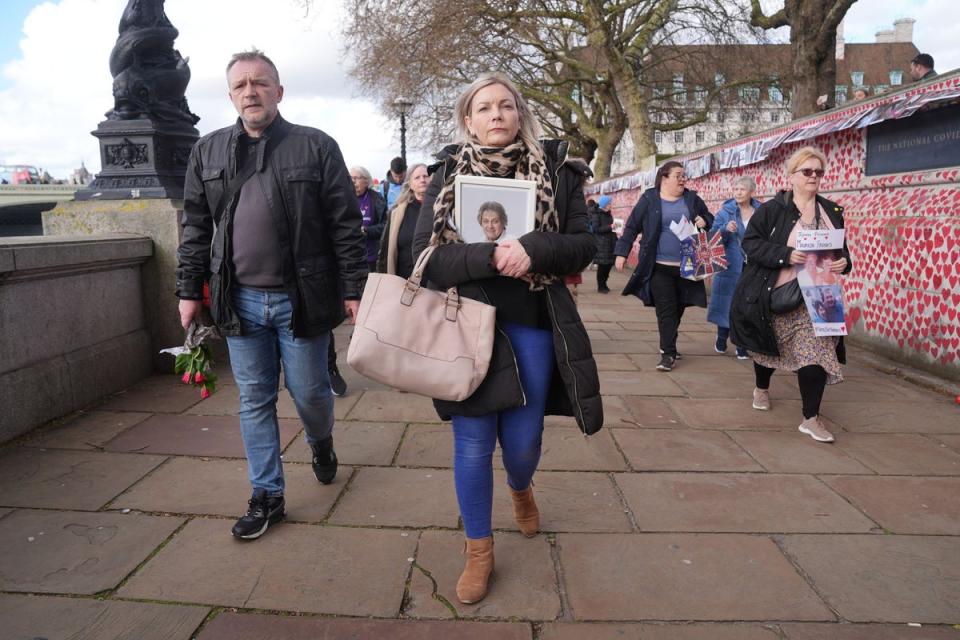 The gathering at the Covid Memorial Wall (Lucy North/PA Wire)