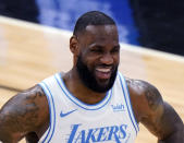FILE - In this Jan. 23, 2021, file photo, Los Angeles Lakers forward LeBron James smiles during the second half of an NBA basketball game against the Chicago Bulls in Chicago. The Associated Press asked eight of the greatest current and former champions, including James, from seven different sports to find out what impressed them most about Tom Brady.(AP Photo/Nam Y. Huh)