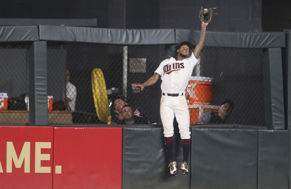 Minnesota Twins center fielder Byron Buxton (25) catches a fly ball by Cleveland Indians designated hitter Edwin Encarnacion (10) during the seventh inning Aug. 15, 2017, in Minneapolis. (AP)