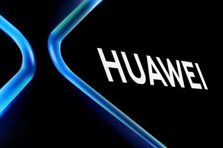 FILE PHOTO: The Huawei logo is displayed ahead of the Mobile World Congress (MWC 19) in Barcelona, Spain, February 24, 2019. REUTERS/Sergio Perez/File Photo
