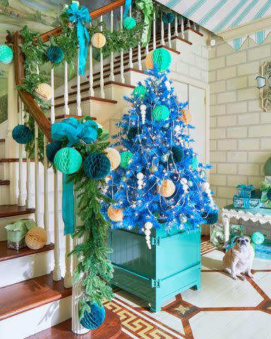Hector Manuel Sanchez; Design: John Loecke and Jason Oliver Nixon; Styling: Kendra Surface Weenie, the pair’s rescue dog, admires the holiday finery.