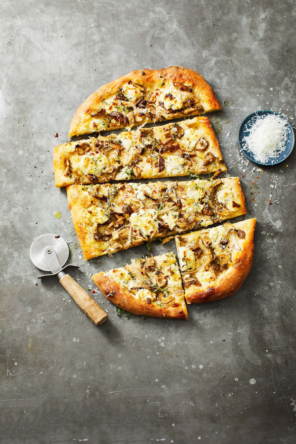 <p>Oyster and shiitake mushrooms make for the best duo on a bed of pillowy ricotta and provolone cheese. This rustic-style pizza is ready in 30 minutes flat!</p><p><em><a href="https://www.goodhousekeeping.com/food-recipes/a38413694/fall-mushroom-pizza-recipe/" rel="nofollow noopener" target="_blank" data-ylk="slk:Get the recipe »;elm:context_link;itc:0;sec:content-canvas" class="link ">Get the recipe »</a></em></p>