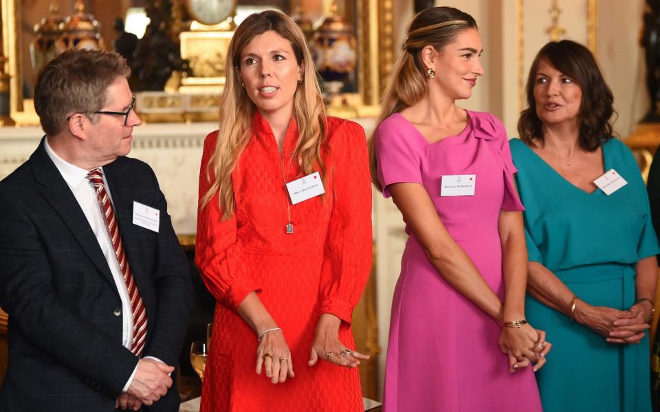 Kevin Brennan, the shadow minister for victims and sentencing, with Carrie Johnson, Zara McDermott and Karen McDermott at the reception for those who support the survivors of sexual abuse