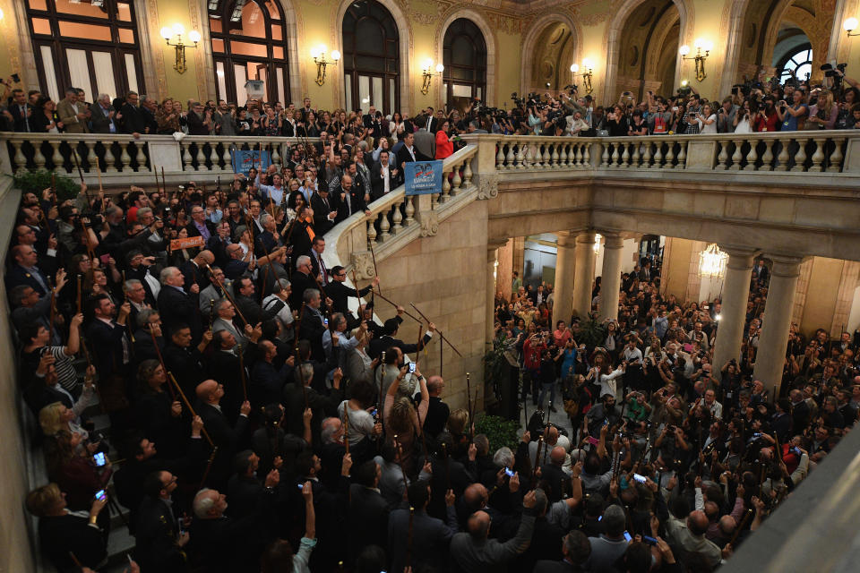 <p>Mayors of Catalonia celebrate after the news that the Catalan Parliament has voted in favour of independence from Spain at the Catalan Government building Generalitat de Catalunya on Oct. 27, 2017 in Barcelona, Spain. MPs in the Catalan parliament have today voted following a two day session on how to respond the Spanish governmentÂs enacting of Article 155, which would curtail Catalan autonomy. (Photo: David Ramos/Getty Images) </p>