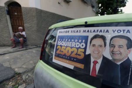 An election banner that reads "Pastor Silas Malafaia votes, councilman Alexandre Isquierdo, 25025, we are one" is pictured in Rio de Janeiro, Brazil, September 29, 2016. REUTERS/Sergio Moraes