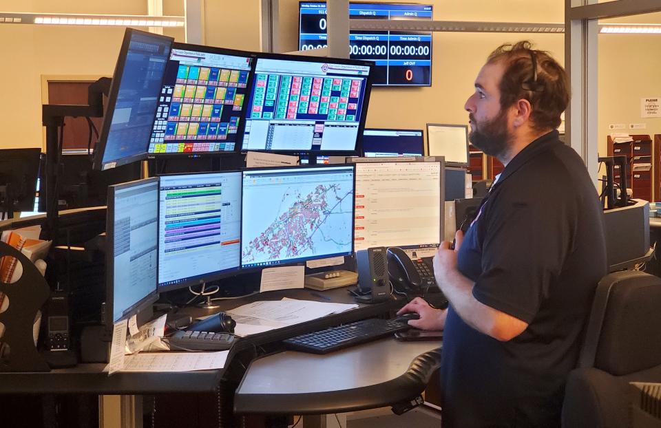 Dispatcher Dan Fitzpatrick is shown, on Oct. 24, 2022, at the Erie County Department of Public Safety's 911 Center on Oliver Road in Summit Township.