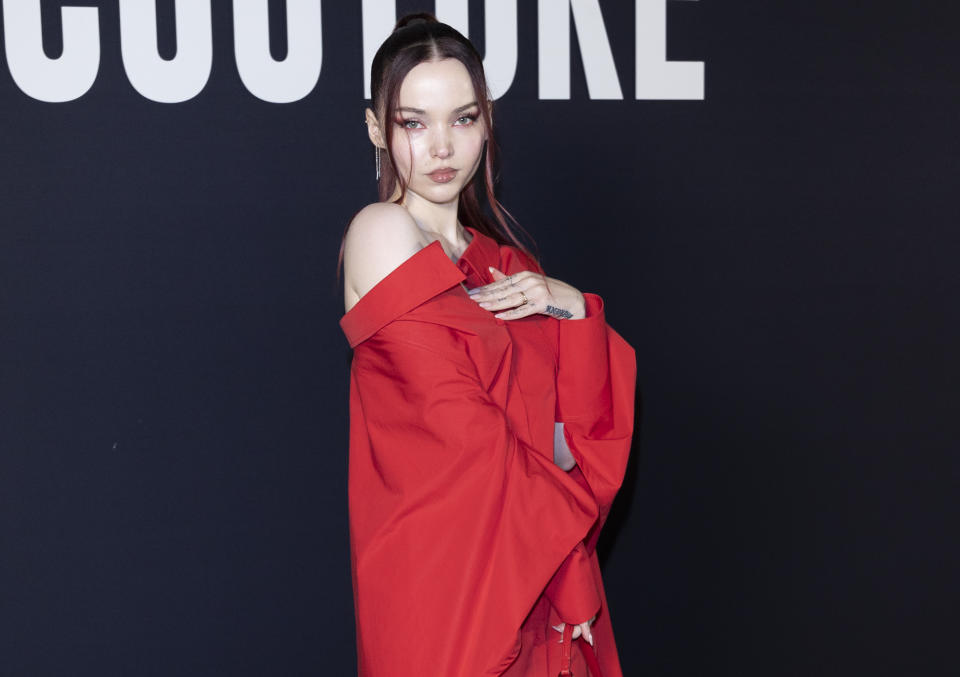 <p><a href="https://people.com/tag/dove-cameron/" rel="nofollow noopener" target="_blank" data-ylk="slk:Dove Cameron" class="link ">Dove Cameron</a> stuns in a monochromatic red look at the Valentino Haute Couture Spring/Summer 2023 show during Paris Fashion Week on Jan. 25. </p>