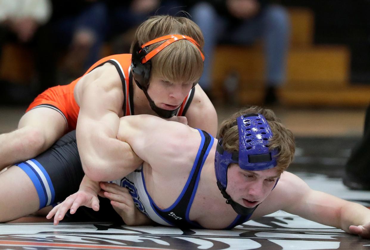 Kaukauna's Greyson Clark, left, will be one of the top wrestlers at the 24th annual Cheesehead Invitational held at Kaukauna high school this weekend.