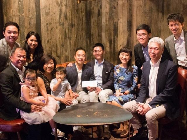 Li Huanwu and his husband Heng Yirui (middle) along with their family members after their wedding in South Africa. PHOTO: Dear Straight People/Facebook