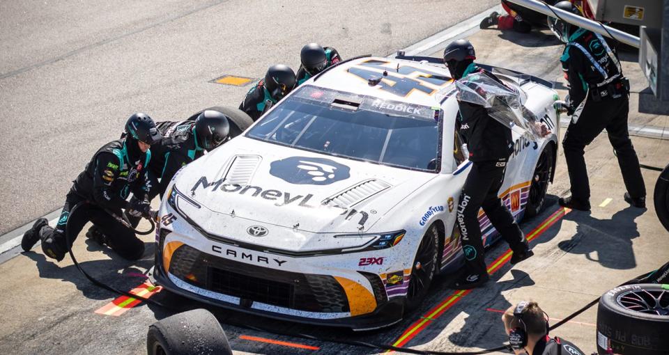 Tyler Reddick makes a pit stop during a NASCAR Cup Series race at Darlington.