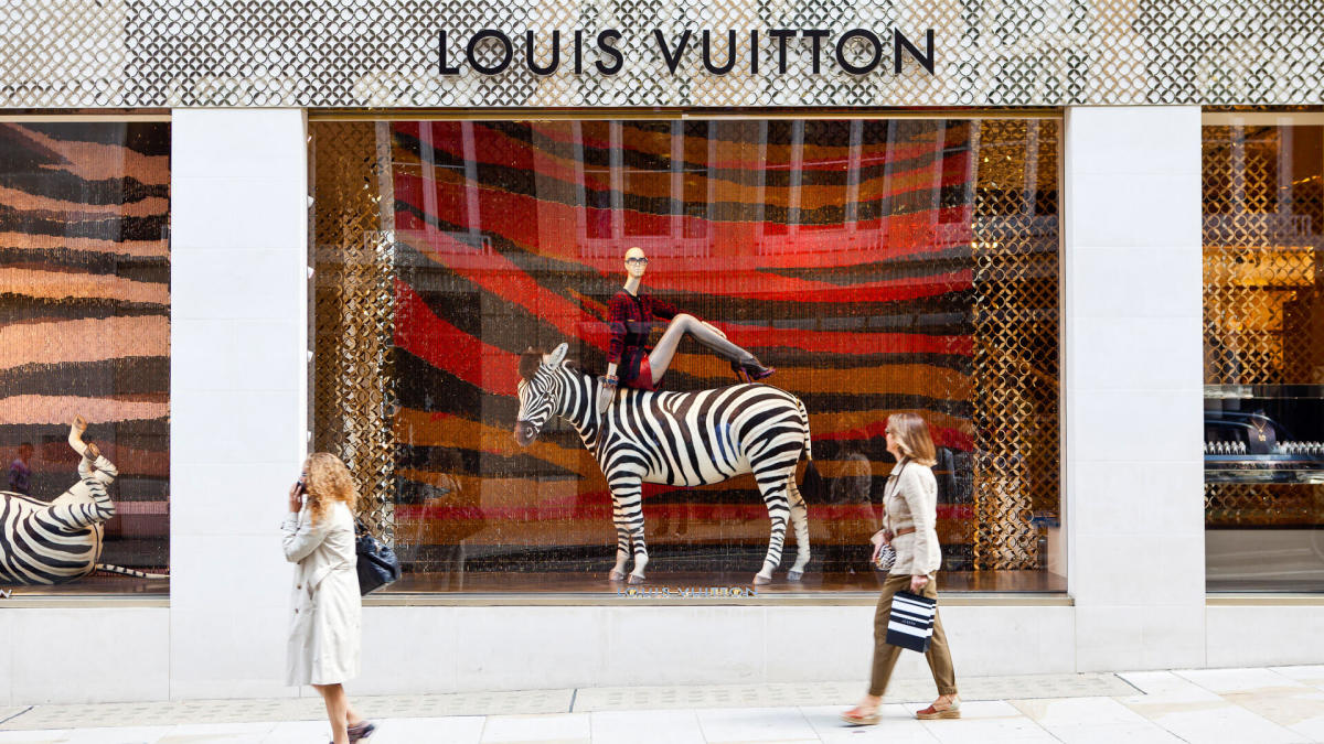 Louis Vuitton flagship store in London in the evening Stock Photo