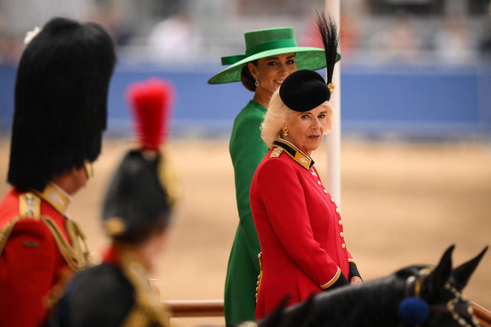 Britain's Queen Camilla (R) and Britain's Catherine, Princess of Wales (C) attend the King's Birthday Parade, 'Trooping the Colour' on Horse Guards Parade, in London on June 17, 2023. The ceremony of Trooping the Colour is believed to have first been performed during the reign of King Charles II. Since 1748, the Trooping of the Colour has marked the official birthday of the British Sovereign. Over 1500 parading soldiers and almost 300 horses take part in the event. (Photo by Daniel LEAL / AFP) (Photo by DANIEL LEAL/AFP via Getty Images)