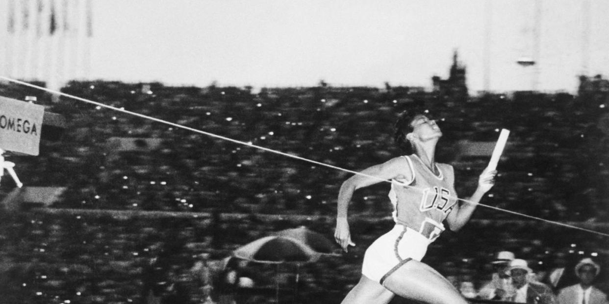 wilma rudolph crossing the finish line in relay