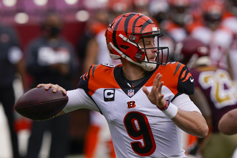 Cincinnati Bengals quarterback Joe Burrow (9) throwing the ball during the first half of an NFL football game against the Washington Football Team, Sunday, Nov. 22, 2020, in Landover. (AP Photo/Susan Walsh)