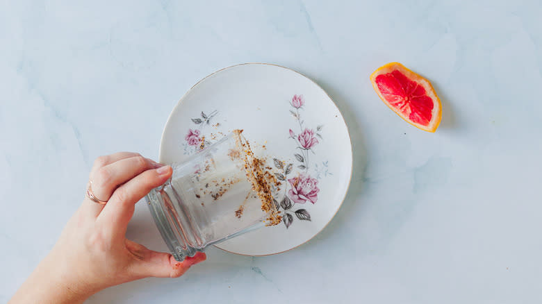 Running glass in salt on plate