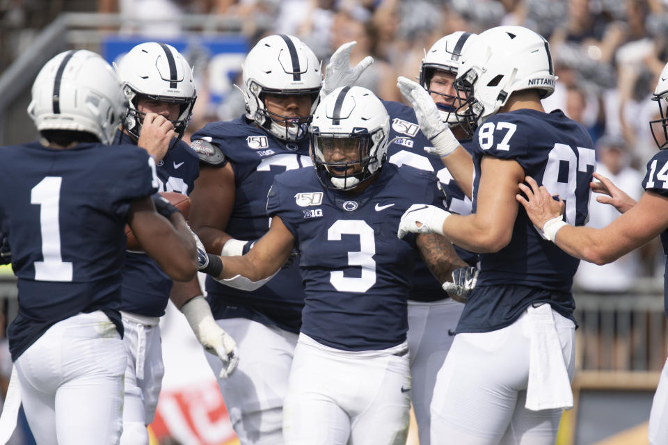 Penn State running back Ricky Slade (3) celebrates his first quarter touchdown against Idaho in a NCAA college football game in State College, Pa., on Saturday, Aug. 31, 2019. (AP Photo/Barry Reeger)