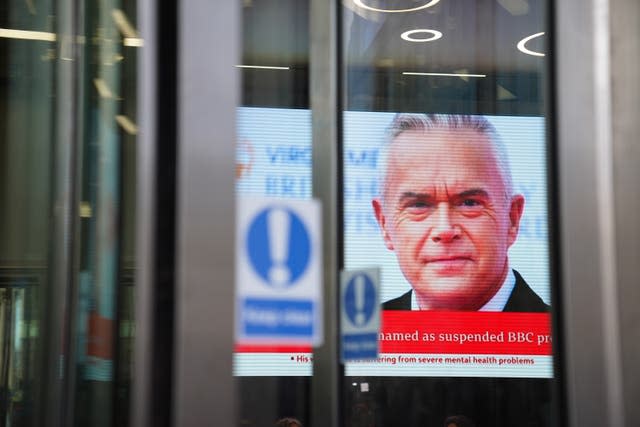 A screen in BBC Broadcasting house displaying presenter Huw Edwards