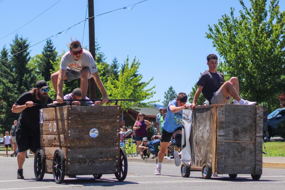 Teams of three compete in ore cart races, a new competition in the Bohemia Mining Days festival in July.
