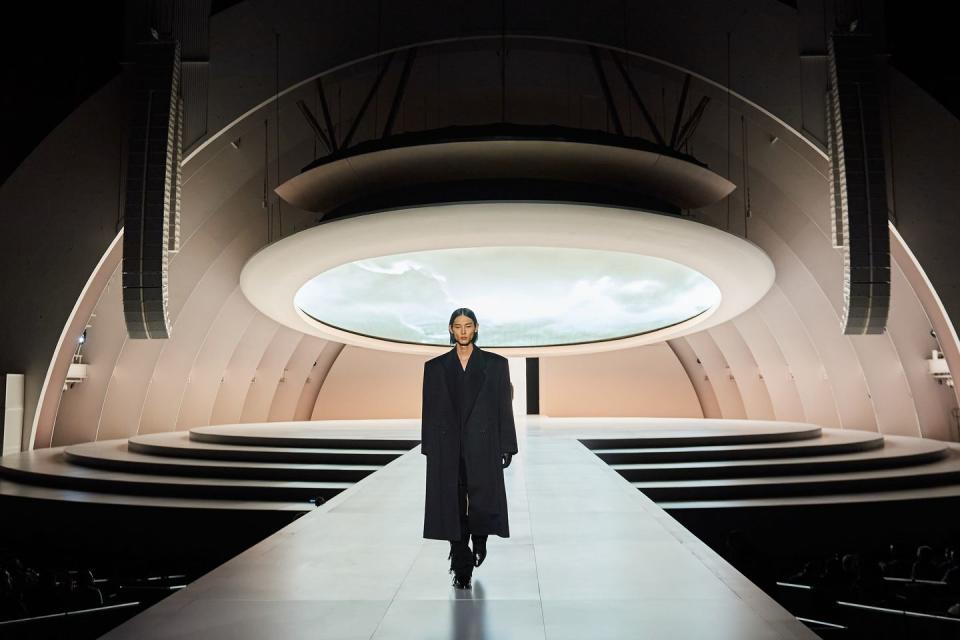 a model walks the runway at the hollywood bowl