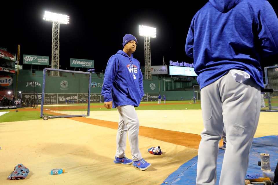 Fourteen years after he became a Red Sox legend, Dave Roberts is back at Fenway Park as manager of the Los Angeles Dodgers. (Getty Images)