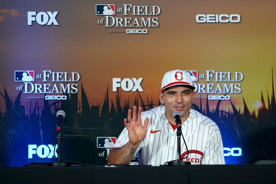 Cincinnati Reds first baseman Joey Votto (19) answers questions during a press conference ahead of a game against the Chicago Cubs, Thursday, Aug. 11, 2022, at the MLB Field of Dreams stadium in Dyersville, Iowa. 