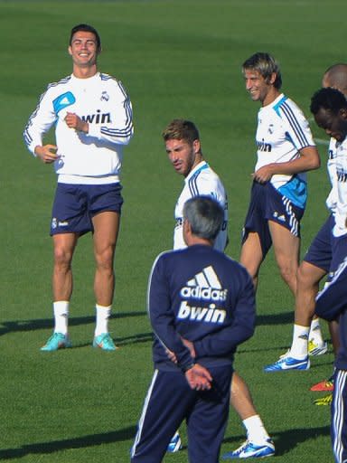 Real Madrid's Cristiano Ronaldo (L) and Sergio Ramos (C), seen here with teammates during a training session in Madrid, on October 6, on the eve of their El Clasico match against Barcelona