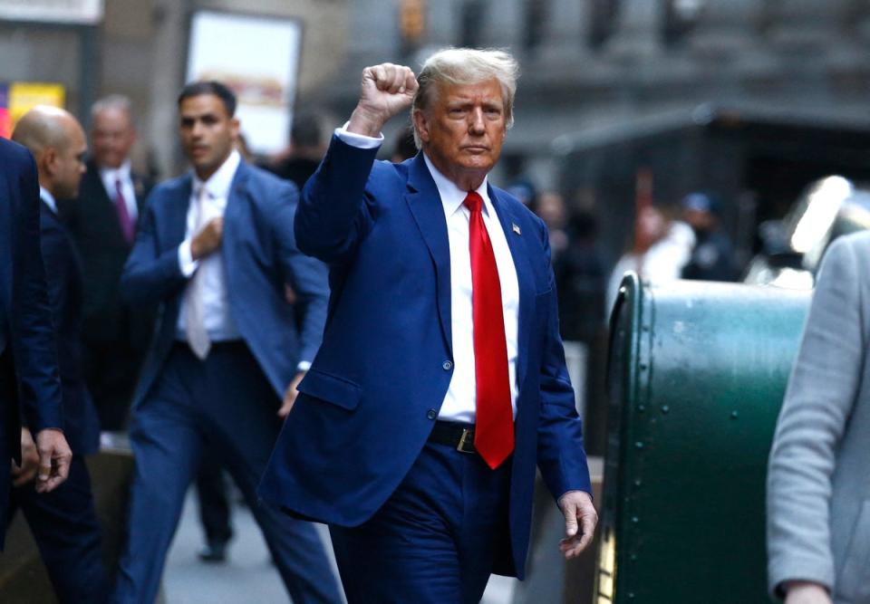 Donald Trump leaves his civil fraud trial on 11 January in New York (AFP via Getty Images)