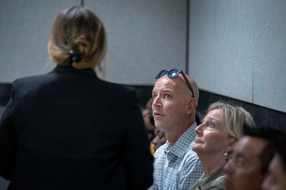 Assistant Public Defender Natalie Gordon talks to former Royal Palm Beach High school teacher Robert Krasnicki at his court appearance in September. He violated the pre-trial diversion that could have resulted in him having the charges dropped.