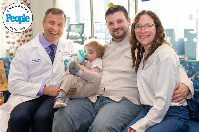 <p>Mateo Salcedo / Hassenfeld Children's Hospital at NYU Langone</p> Dr. Adam Griesemer with Cooper, Sherman and Amanda Cota on Feb. 21