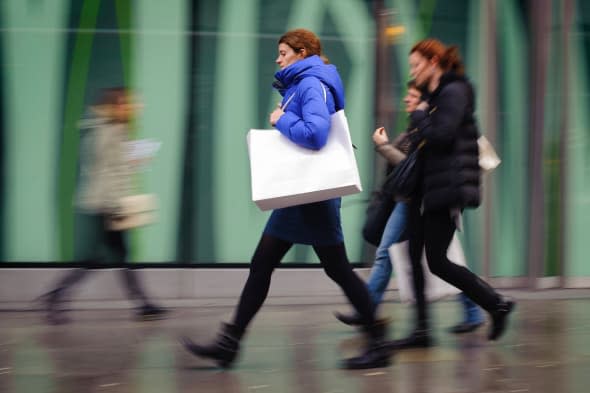 Embargoed to 0001 Tuesday April 15File photo dated 17/01/14 of shoppers carrying shopping bags on Oxford Street, in central London as high streets suffered a second month in a row of falling retail sales last month but a better performance from clothing put a silver lining on the gloom. PRESS ASSOCIATION Photo. Issue date: Tuesday April 15, 2014. Like-for-like sales dropped by 1.7% in March compared with the same period in 2013, with the later timing of Easter this year blamed for the fall, according to figures from the British Retail Consortium (BRC). The timing of Easter also deepened the ongoing declines being suffered by embattled grocery retailers. See PA story ECONOMY Retail. Photo credit should read: Dominic Lipinski/PA Wire