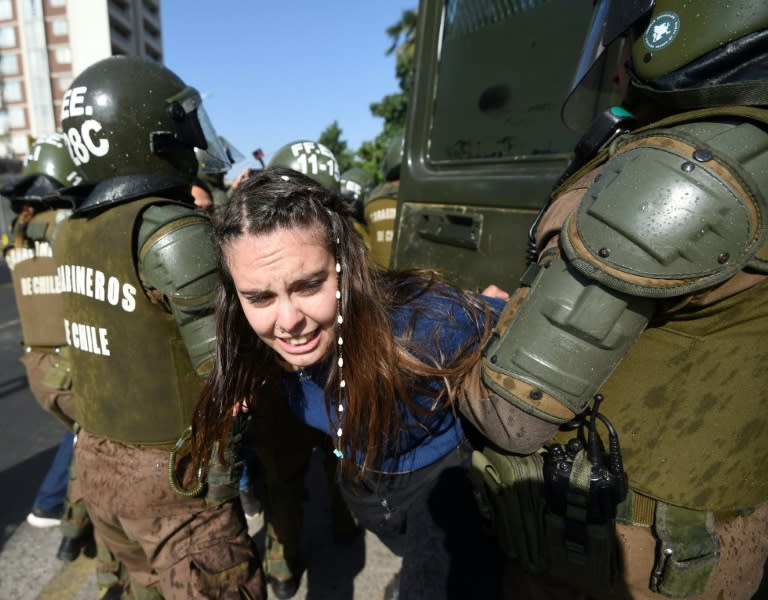 Riot police arrested several demonstrators protesting against Pope Francis's visit to Chile