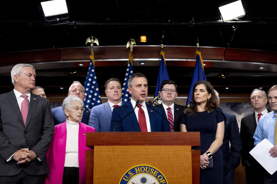 Rep. Kelly Armstrong, R-N.D., center, accompanied House Committee on Oversight and Accountability Chairman Rep. James Comer Jr., R-Ky., left, and others, speaks during a news conference on the House Republican's investigation into the Biden Family on Capitol Hill in Washington, Wednesday, May 10, 2023. (AP Photo/Andrew Harnik)