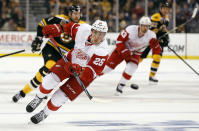 Detroit Red Wings' Tomas Jurco chases down a loose puck against the Boston Bruins during the first period of Game 1 of a first-round NHL playoff hockey series in Boston on Friday, April 18, 2014. (AP Photo/Winslow Townson)