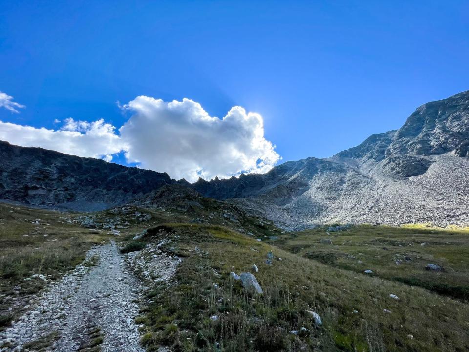 The view of Mayflower Gulch as a cloud passes over the sun.