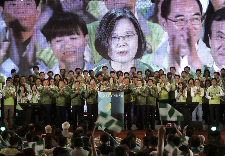 Taiwan President and presidential candidate of Democratic Progressive Party (DPP) in the 2020 elections Tsai Ing-wen, center, cheers with party members during the party's anniversary in Taipei, Taiwan, Saturday, Sept. 28, 2019. (AP Photo/Chiang Ying-ying)