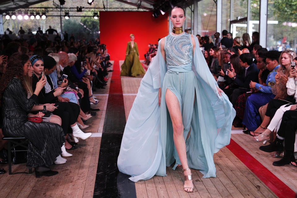 A model wears a creation as part of the Elie Saab Ready To Wear Spring-Summer 2020 collection, unveiled during the fashion week, in Paris, Saturday, Sept. 28, 2019. (AP Photo/Francois Mori)