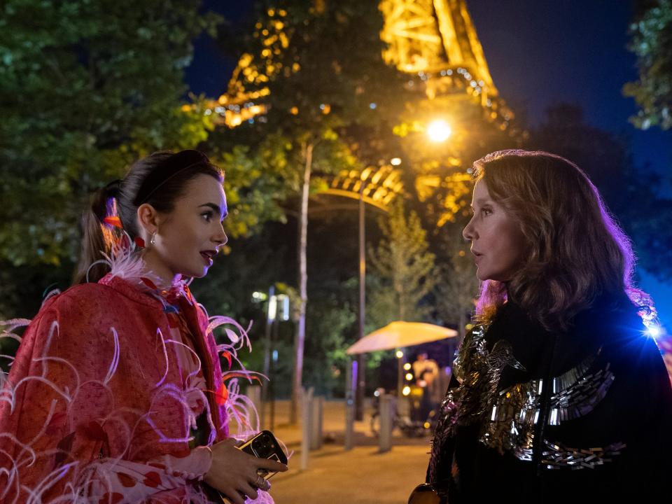 emily and sylvie in front of eiffel tower on emily in paris season 3