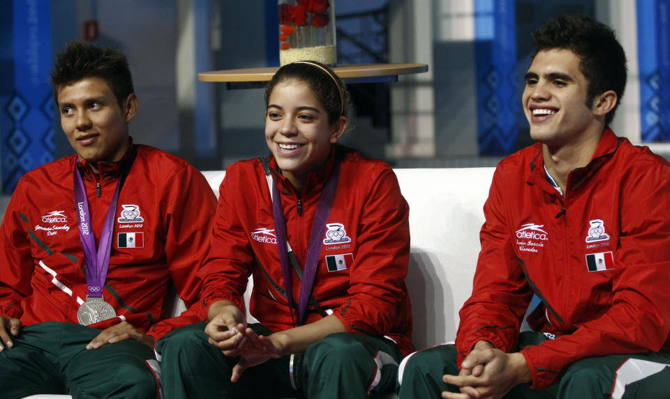 Germán Sánchez (primero a la izquierda) fue medallista en Londres 2012, pero su beca no llega ni a los seis mil pesos mensuales. Estará en Exatlón 2022. (HECTOR GUERRERO/AFP/GettyImages)