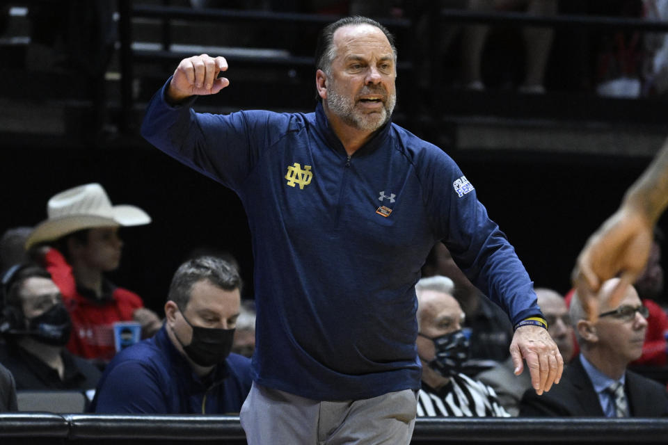 FILE - Notre Dame coach Mike Brey gestures from the sideline during the second half of the team's second-round NCAA college basketball tournament game against Texas Tech, March 20, 2022, in San Diego. Brey is now in his 23rd season in South Bend. The team finished tied for second in the Atlantic Coast Conference last season with eventual national runner-up and one game behind Duke, another Final Four team in Mike Krzyzewski's final season as coach. (AP Photo/Denis Poroy, file)