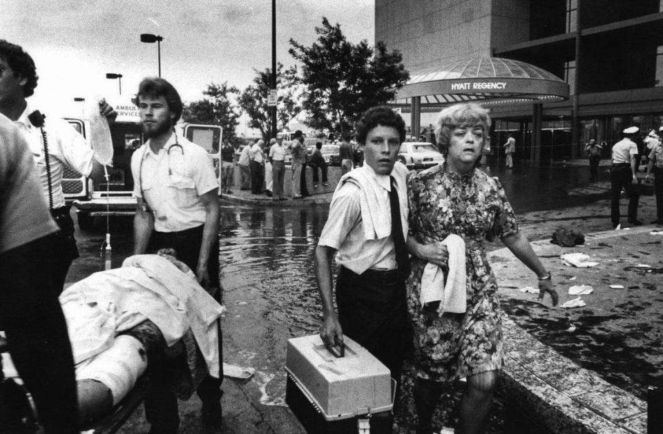 Outside the Hyatt, emergency crews helped treat the survivors.