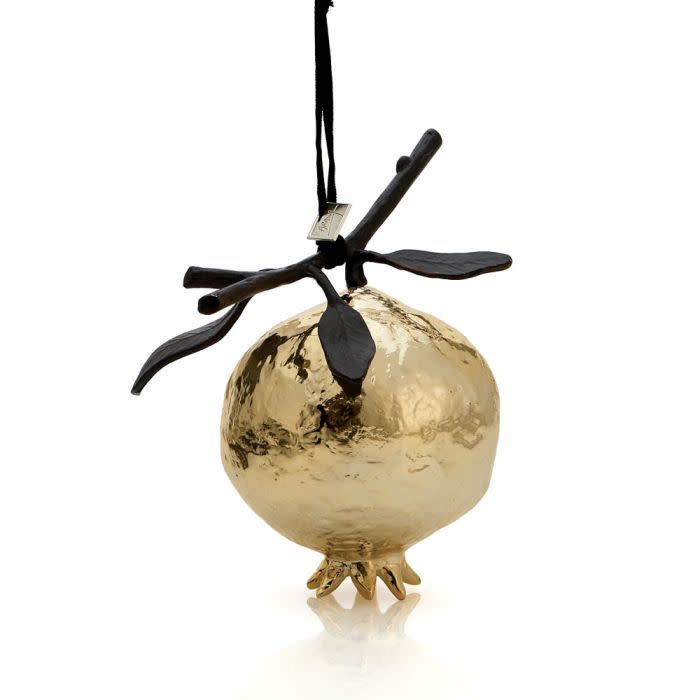 <p><a href="https://www.michaelaram.com/pomegranate-ornament-gold.html" rel="nofollow noopener" target="_blank" data-ylk="slk:Shop Now;elm:context_link;itc:0;sec:content-canvas" class="link rapid-noclick-resp">Shop Now</a></p><p>Gold Pomegranate Ornament</p><p>michaelaram.com</p><p>$60.00</p>