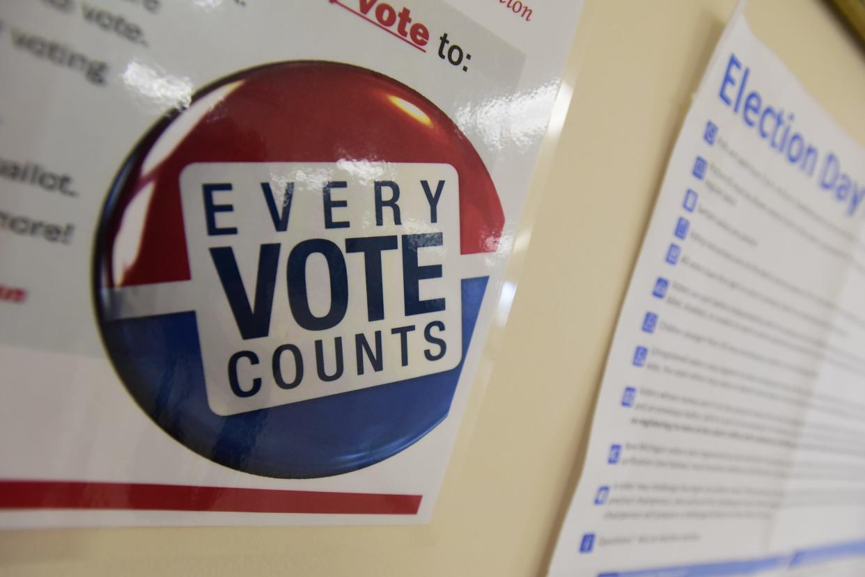 An every vote counts sign hangs on the wall at the Marysville Masonic Temple during the Michigan Primary election on Tuesday, August 3, 2022.